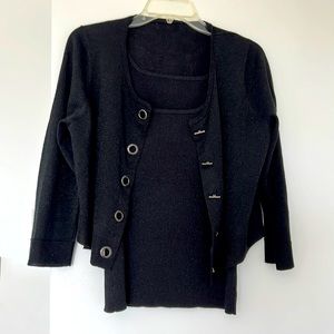 Black and metallic separates that can be worn as a twin set.